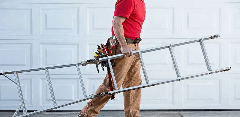 Garage door repair technician arriving with tools and ladder in Wichita, KS