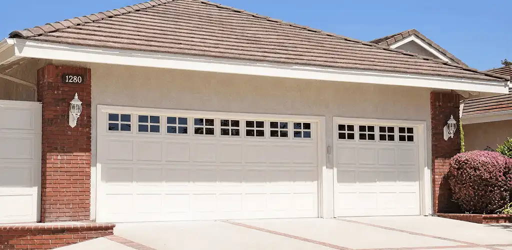 Residential garage door repair service for a double garage door in Wichita, KS